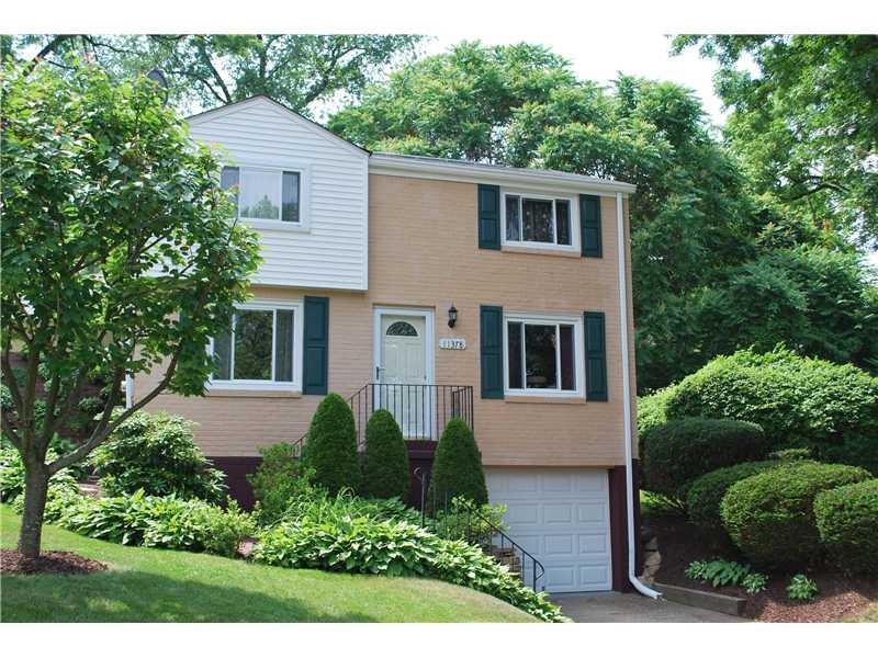 Exterior Front. Lush landscaping