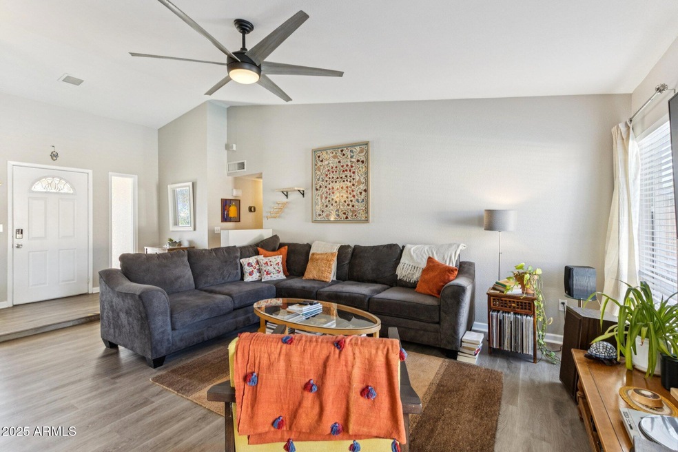 Vaulted ceilings, laminate flooring, fresh paint