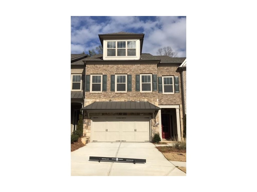 Homesite 56 has brick and stone exterior.