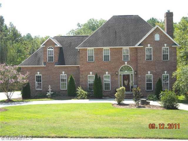 Exterior Front. BRING YOUR OWN BUTLER! Everything else is included wthis all brick 2 story home w/a full basement & a lovely pool. New heat pump, solid doors, security alarm, central vac, 2 story foyer, handcarved window sills, full walk-up attic w/auto fan & floored