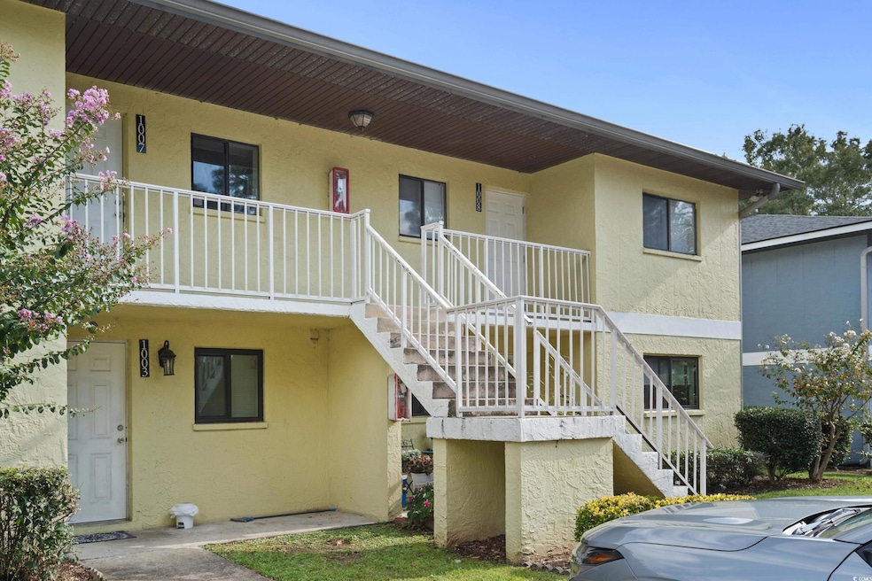 View of front of property featuring a balcony