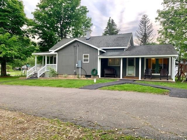 1144 W Reid Rd, Flint, MI 48507 - photo 1