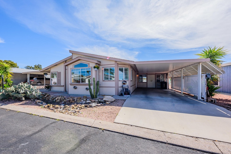 001 - 7677 W. Touchstone