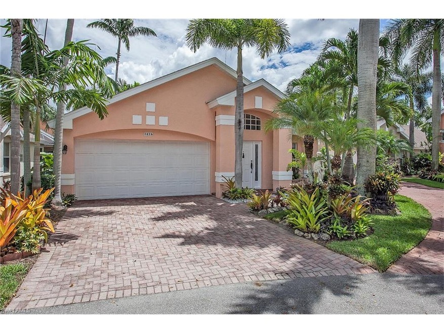 Lovely brick paver driveway and two car garage
