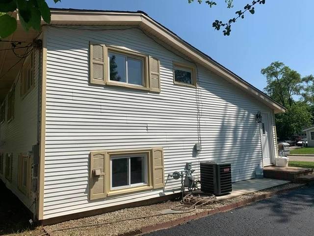 1306 Sacramento Dr, Carpentersville, IL 60110 - photo 1