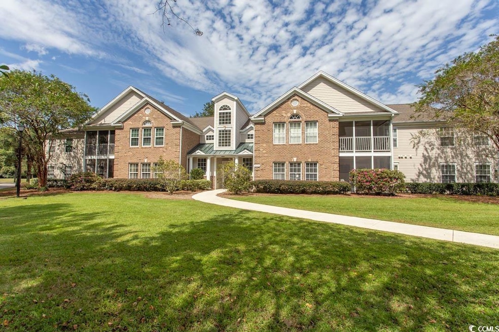 View of front of house featuring a sunroom and a f