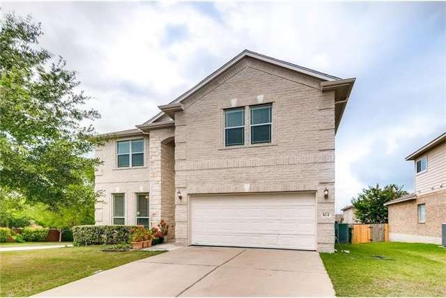 Beautiful white limestone and brick 2 story home. 