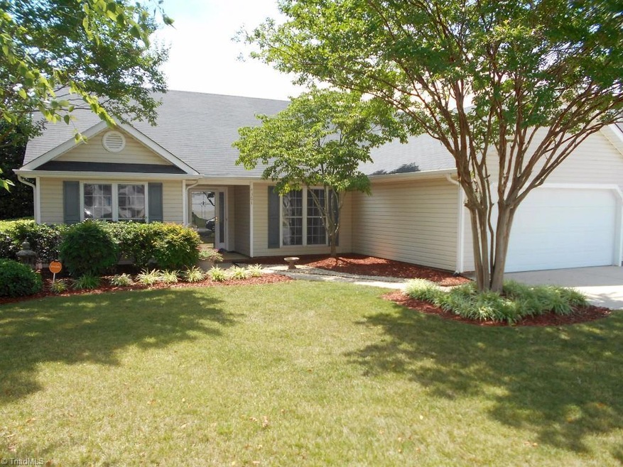 Front of home.  Easy maintenance with vinyl siding and a concrete drive and walk way.