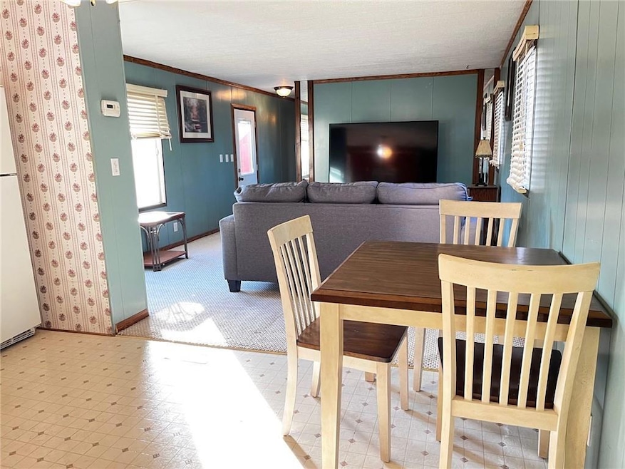 Dining area looking into the living room