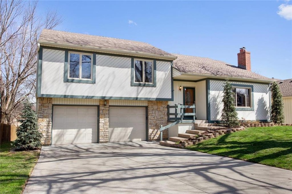 Front Elevation.  Low maintenance vinyl siding and