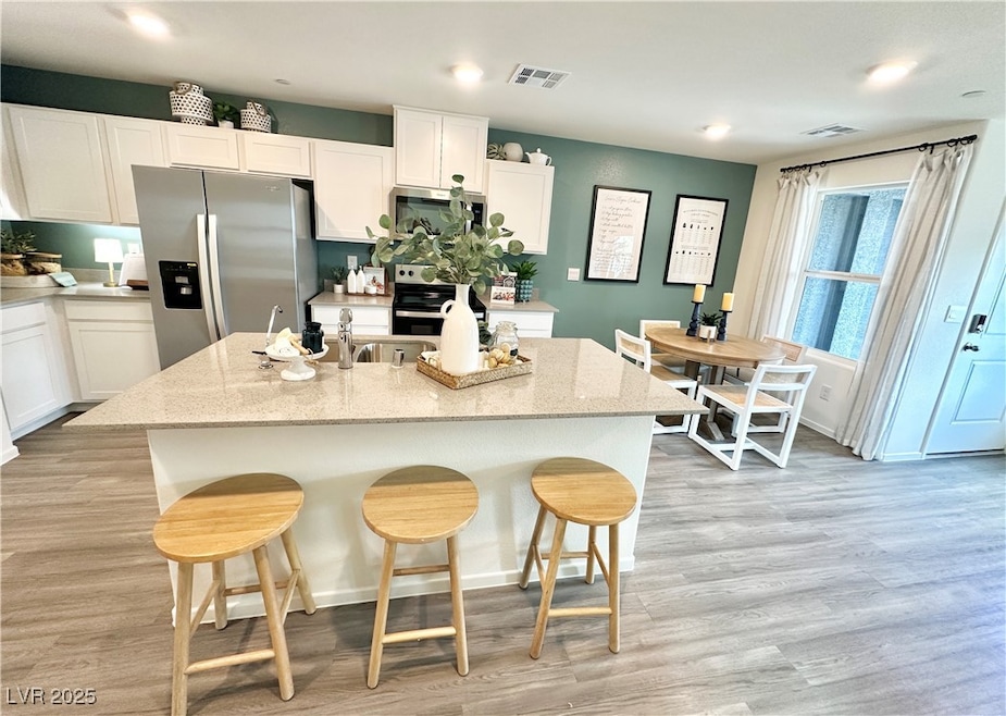 Kitchen featuring appliances with stainless steel