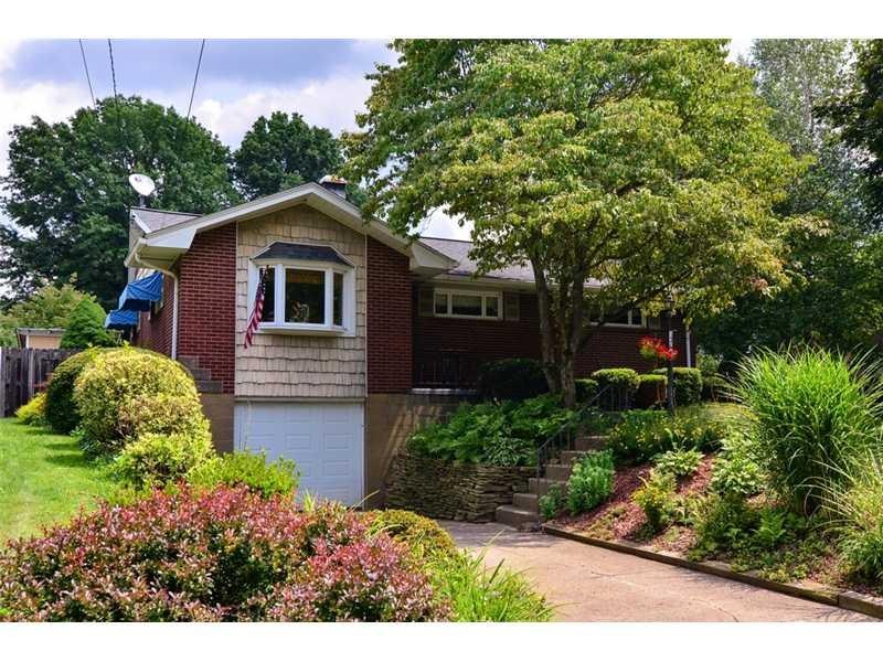 Exterior Front. Beautifully landscaped yard, nice 