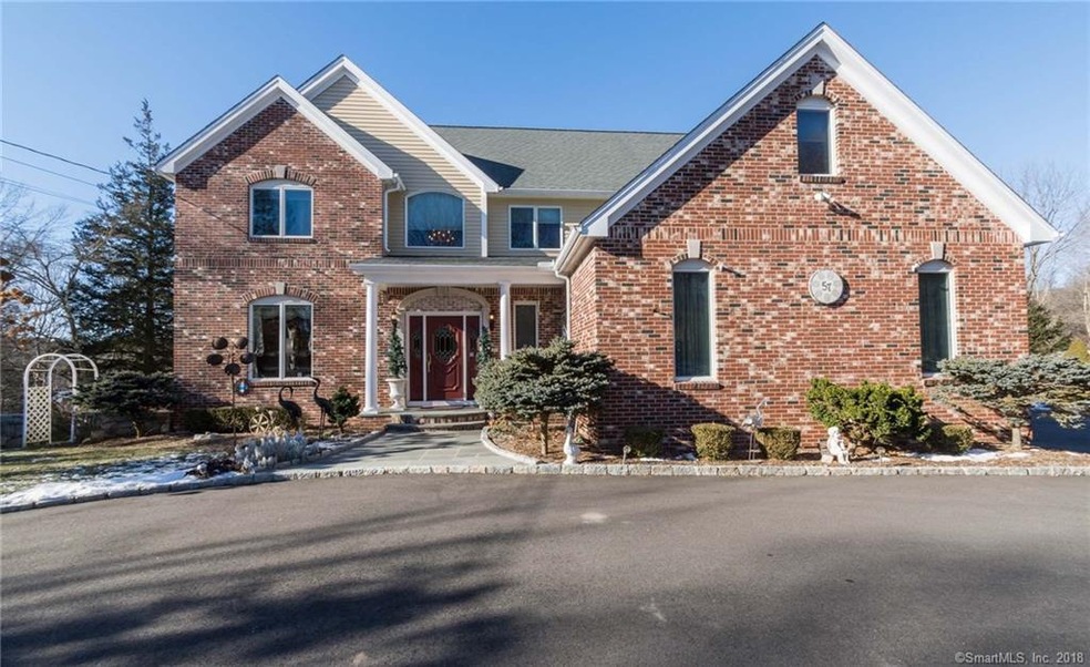 Stately custom built colonial with newly paved cir