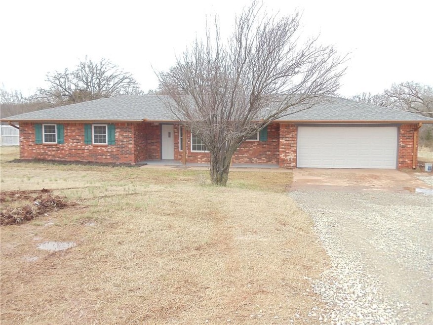 17502 Drummond - New copper gutters. New gravel dr