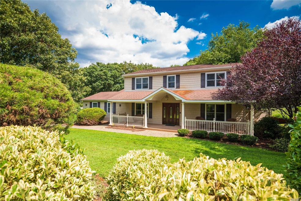 83 Wicks Path, ComMacK, NY 11725 - photo 1