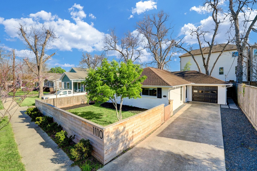 A wood privacy fence, fresh mulch, and mature landscaping will welcome you home. This lovely two-bedroom home is even more beautiful inside.