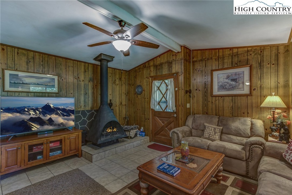 Cozy living room with wood burning fireplace