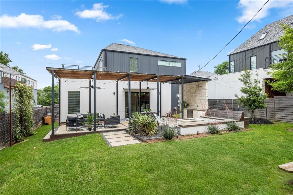 Back of house with an outdoor hangout area and a 