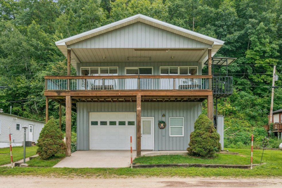 25552 Dawn Cir, Sherrill, IA 52073 - photo 1