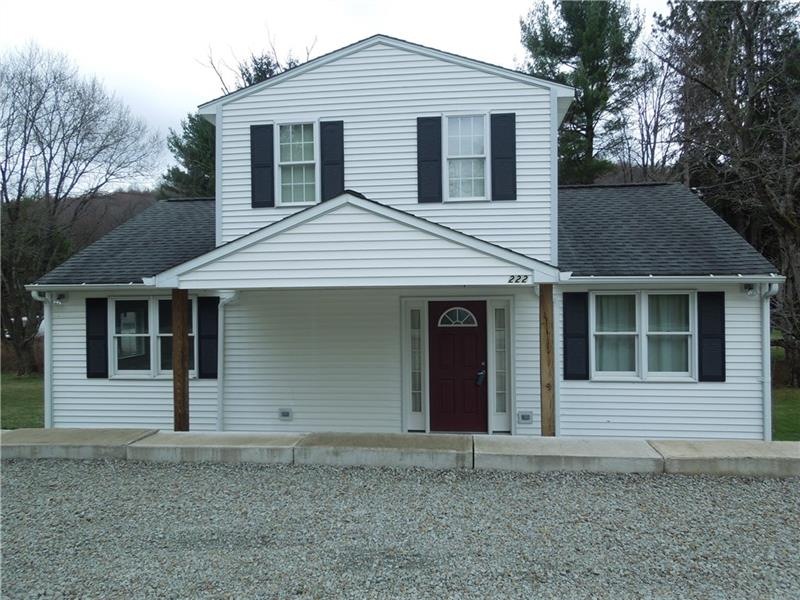 Bright and clean white vinyl siding home with cove