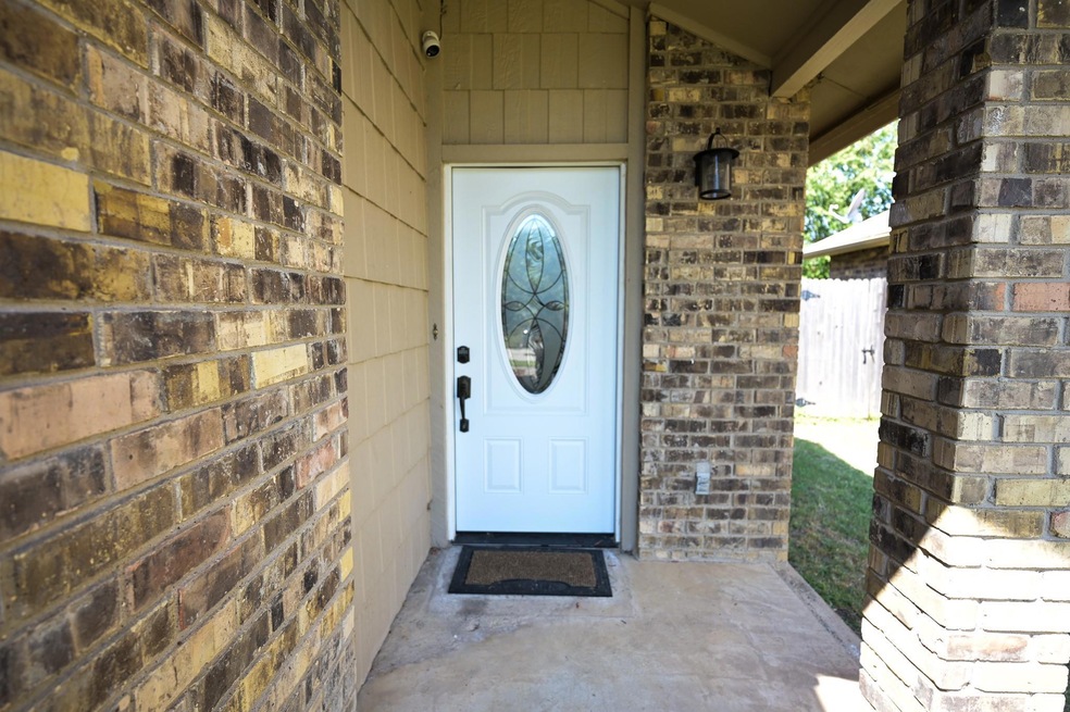 View of entrance to property and covered porch