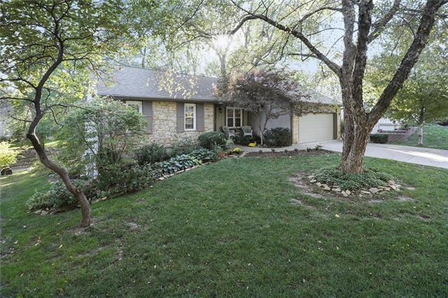 Shutters, stack stone front and lovely front lands
