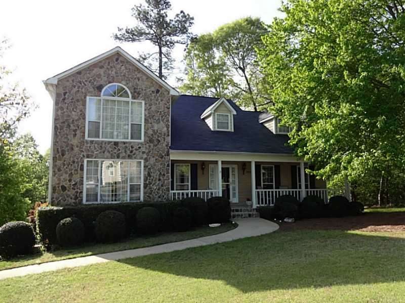 Exterior Front. Well-maintained home featuring sto