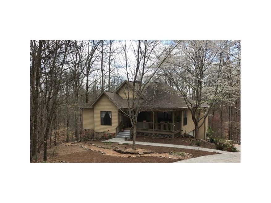 Lovely wooded setting with mature flowering bushes