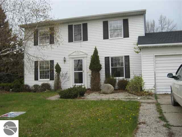 409 Oceana St, Oscoda, MI 48750 - photo 1