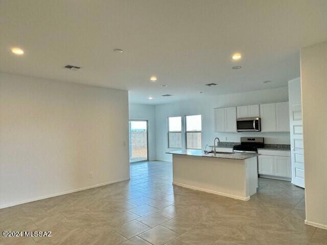 Great room, kitchen, dining area