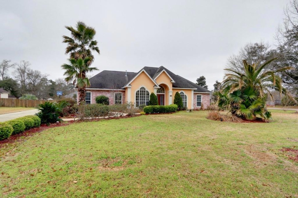 This pretty Brick and Stucco custom built home sit