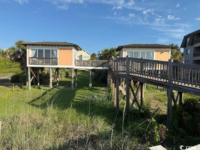 View of yard with a deck