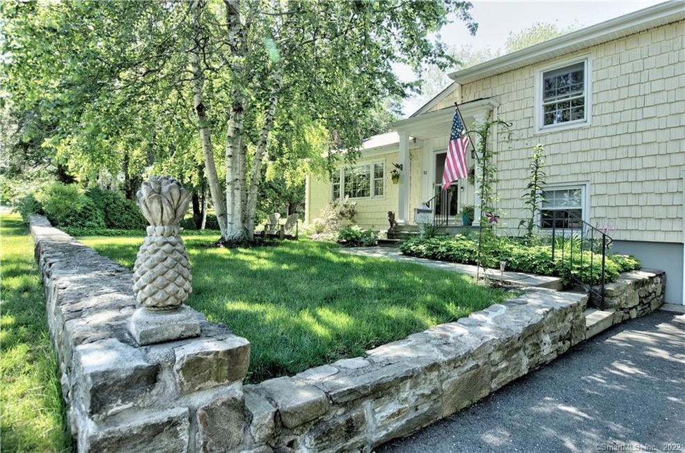 Situated on a beautifully landscaped corner lot bo