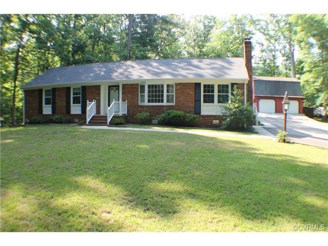 Exterior front of home. Beautiful landscaping. Lon