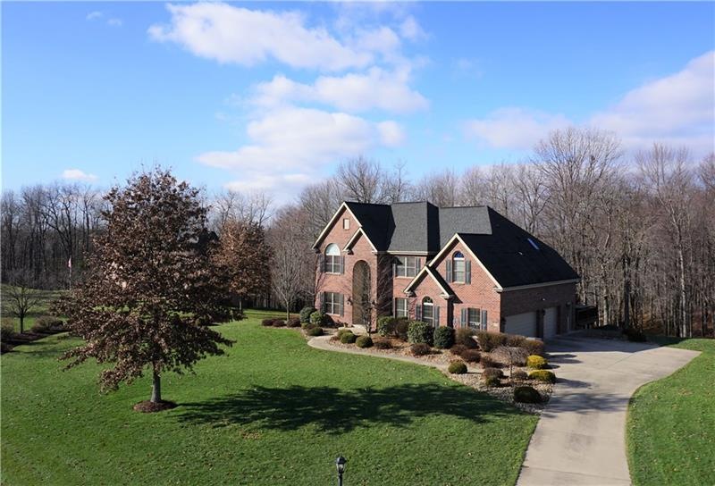 Spectacular all brick custom home on a beautiful h