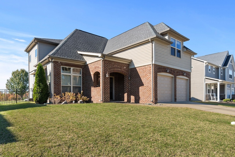 Side Front View, Partial Brick and Vinyl Siding