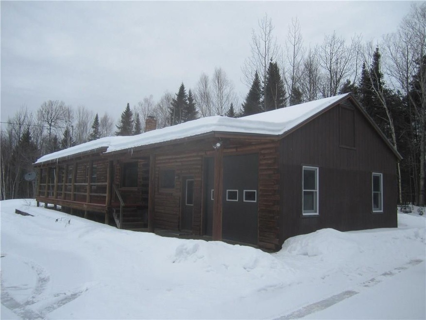 Real log home with nice front porch...