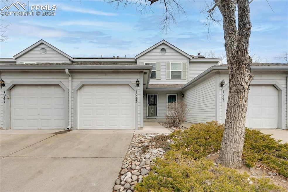 Ranch-style home featuring a garage