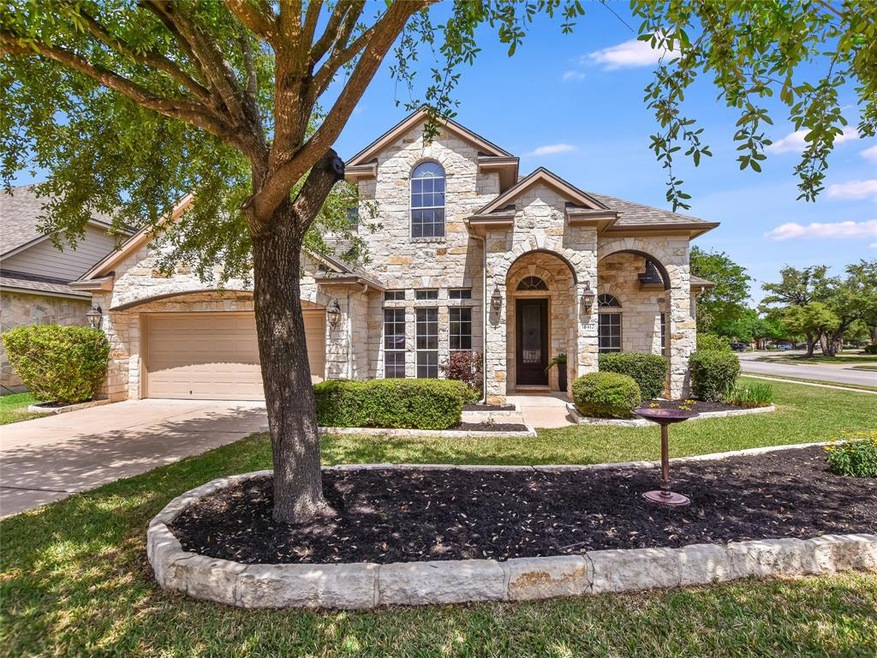 Impressive Texas limestone home tucked away on a b