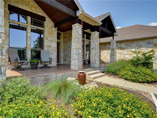 Expansive covered front porch, with a great view of the ranch