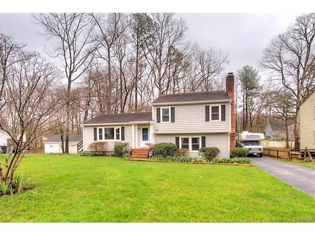 Gorgeous home backing to woods on manicured lot wi