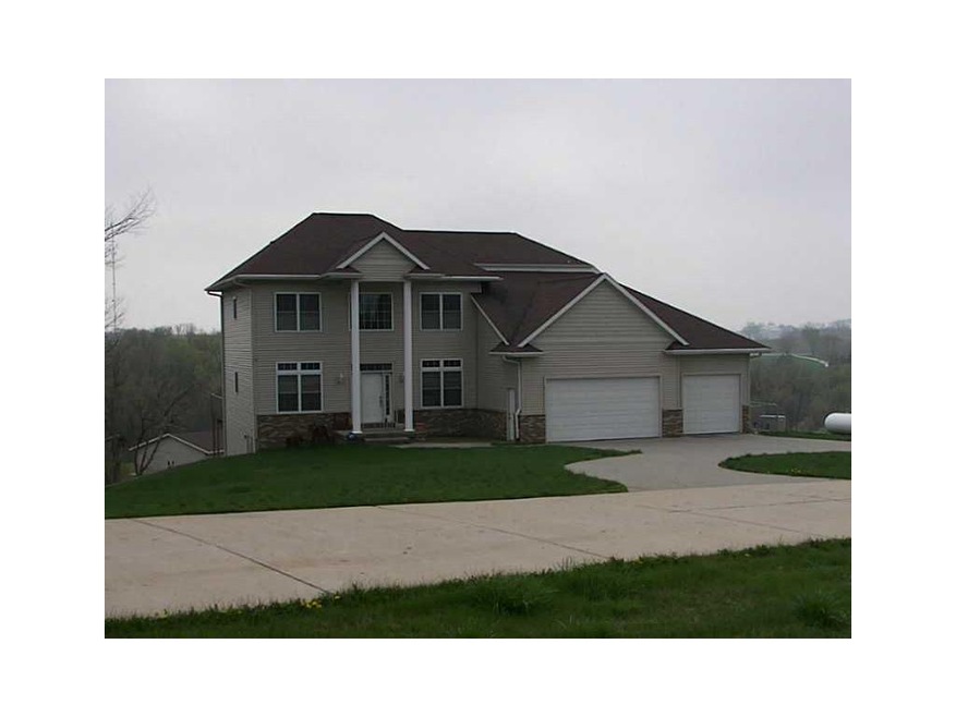 Front Exterior. Beautiful contemporary on over an 