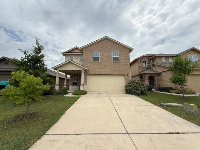 View of front of property with an attached garage