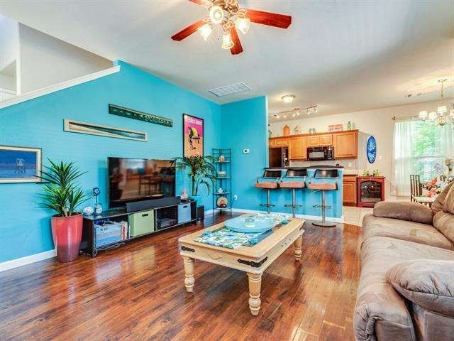 The kitchen opens up to the living room