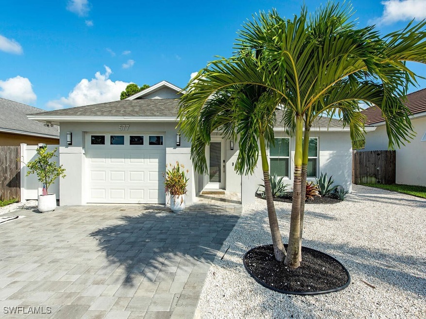 Single story home with a garage