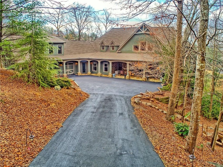 Home sits at end of long winding driveway.   You'l