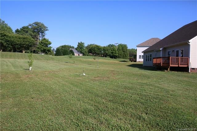 Archadeck overlooking beautiful rear yard.