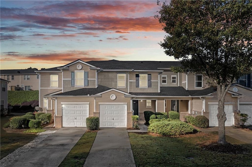 Middle townhome unit with landscaped front yard