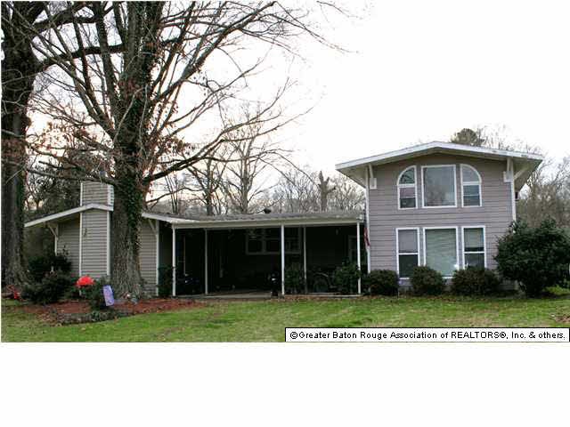 Notice all the windows at front of the house.