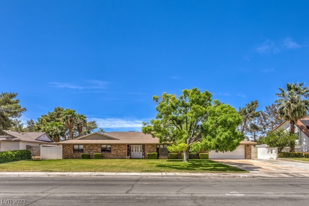 Welcome Home to 5653 Palm St in Las Vegas! This ho
